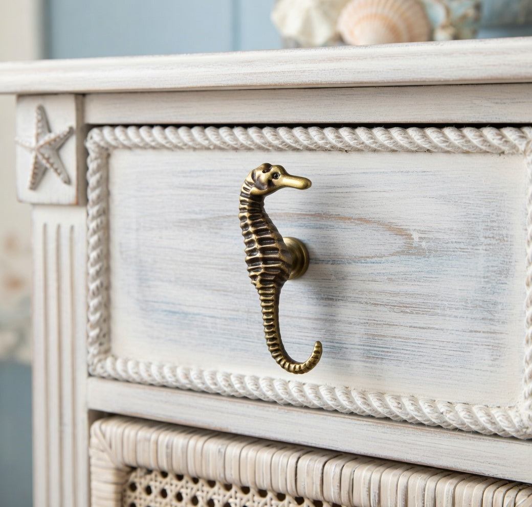 White dresser with seahorse handle and starfish design