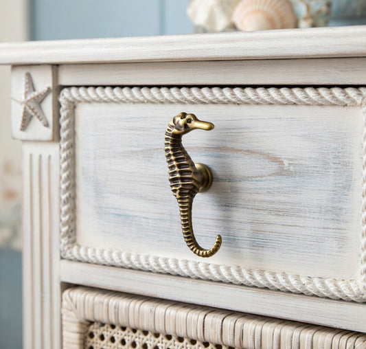 White dresser with seahorse handle and starfish design