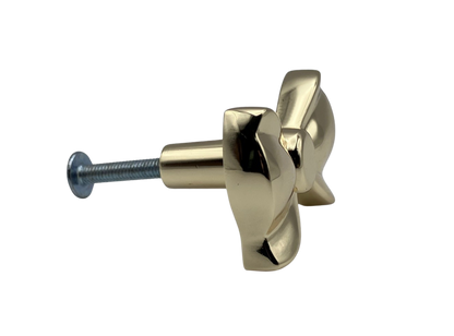Gold cabinet knob on a white background