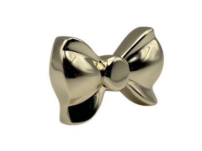 Brass gold button bow knob on a white background