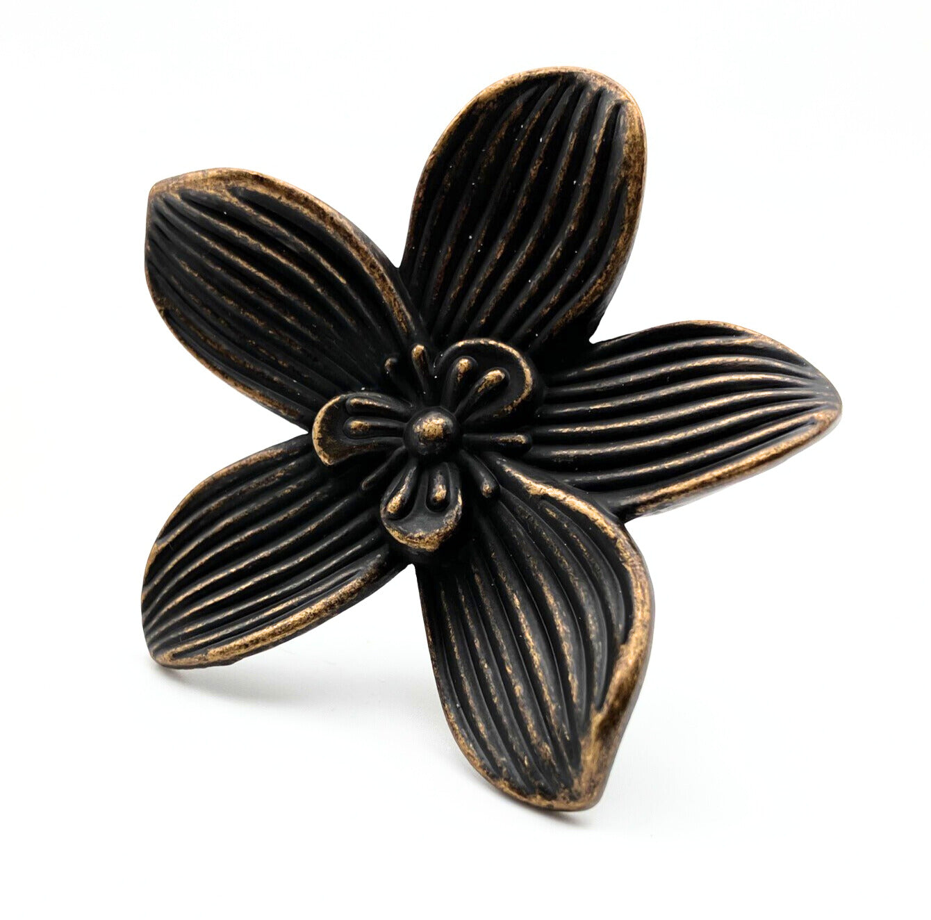 Bronze flower-shaped decorative knob on a white background