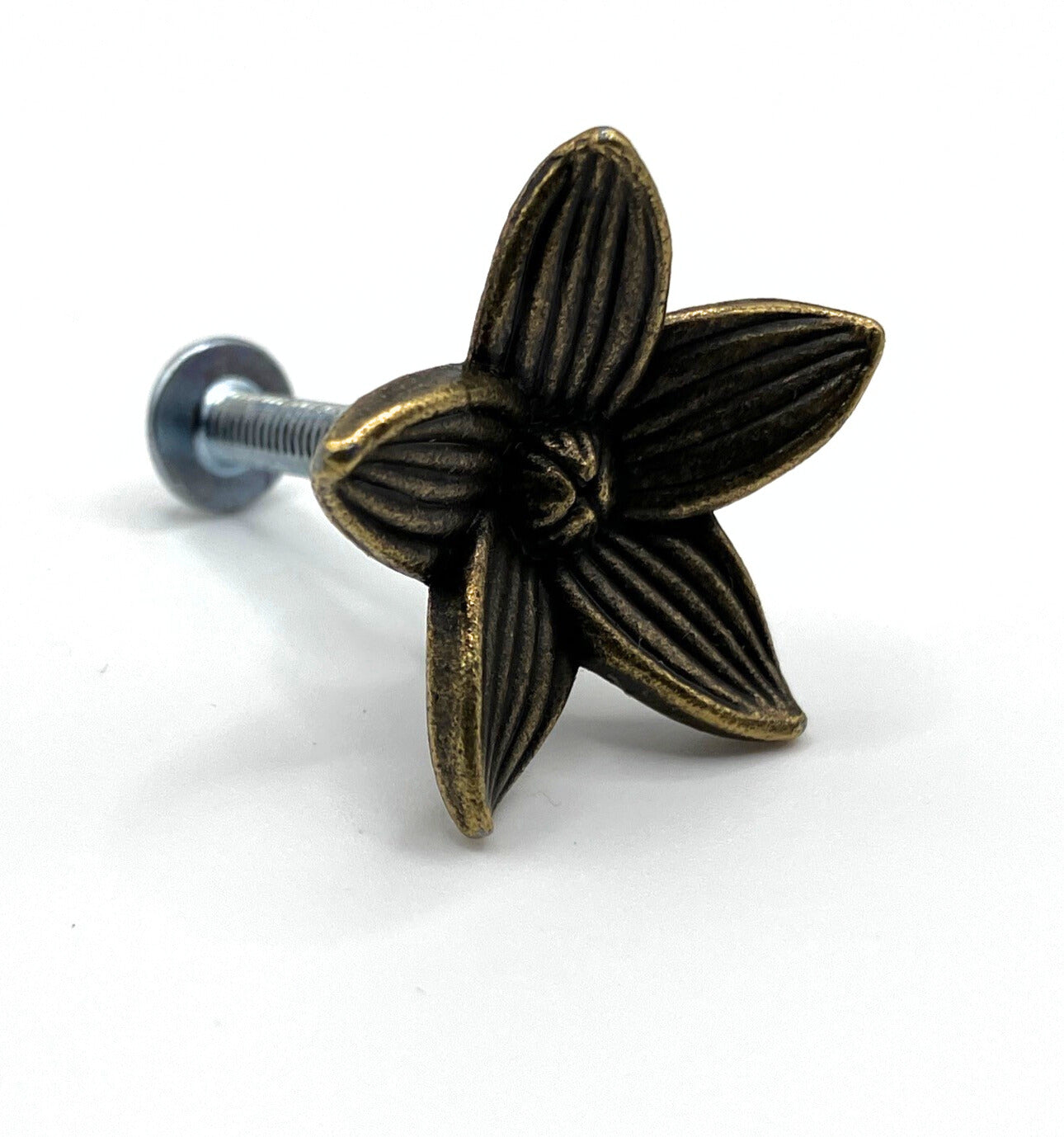 Bronze flower-shaped cabinet knob on a white background
