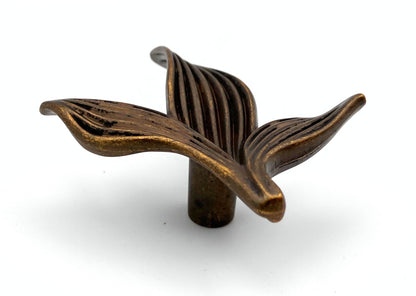 Bronze leaf-shaped cabinet knob on a white background