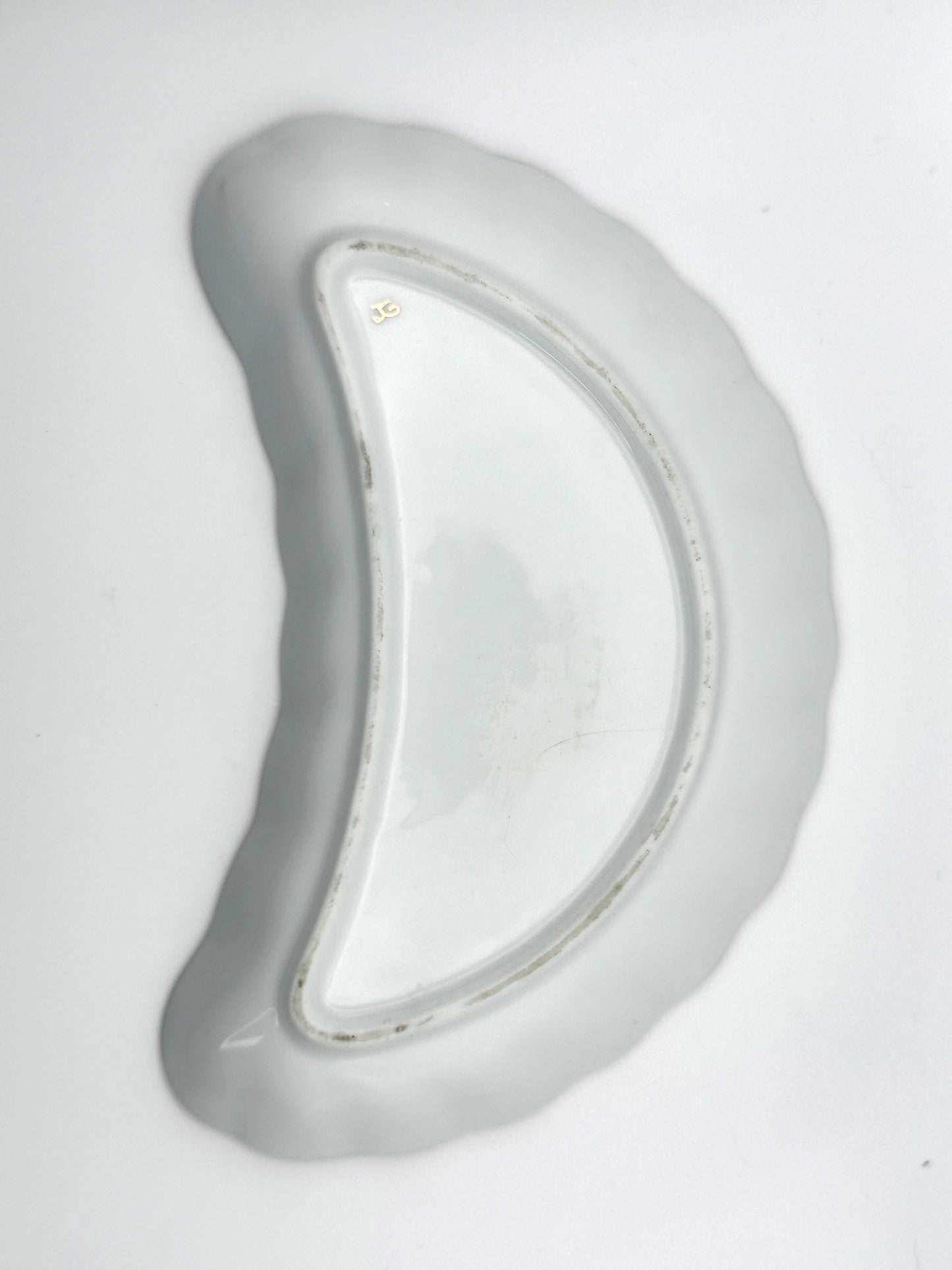Collectible floral bone china dish with crescent shape perfect for trinkets or display