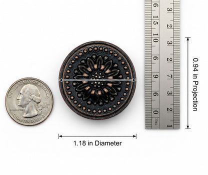 Decorative metal button with measurements shown next to a quarter for scale.