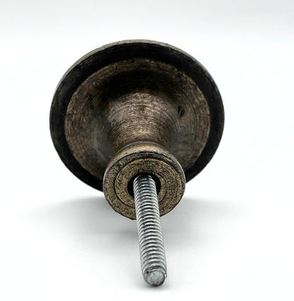 Metal knob with a bolt on a white background