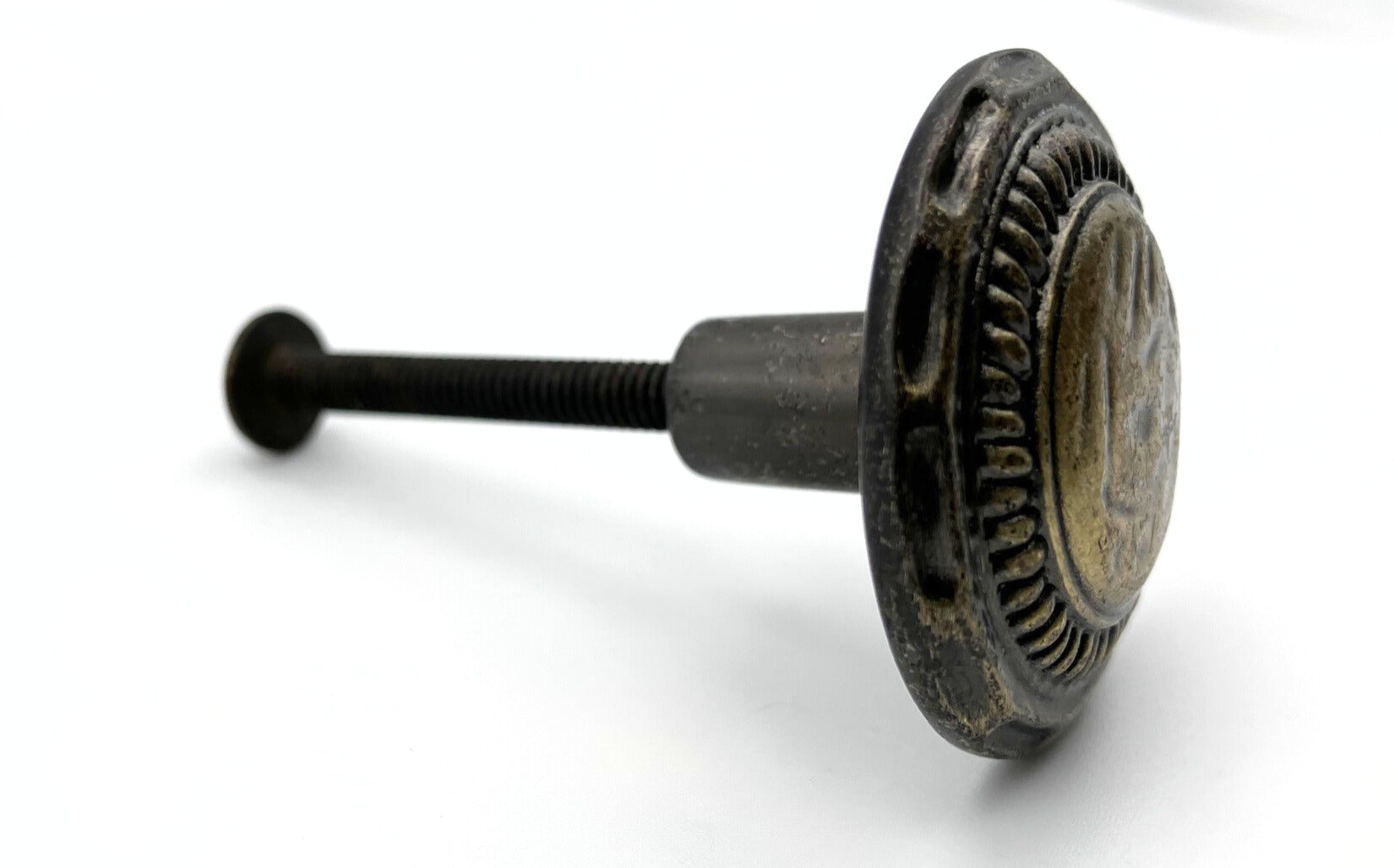 Round Metal knob on a white background