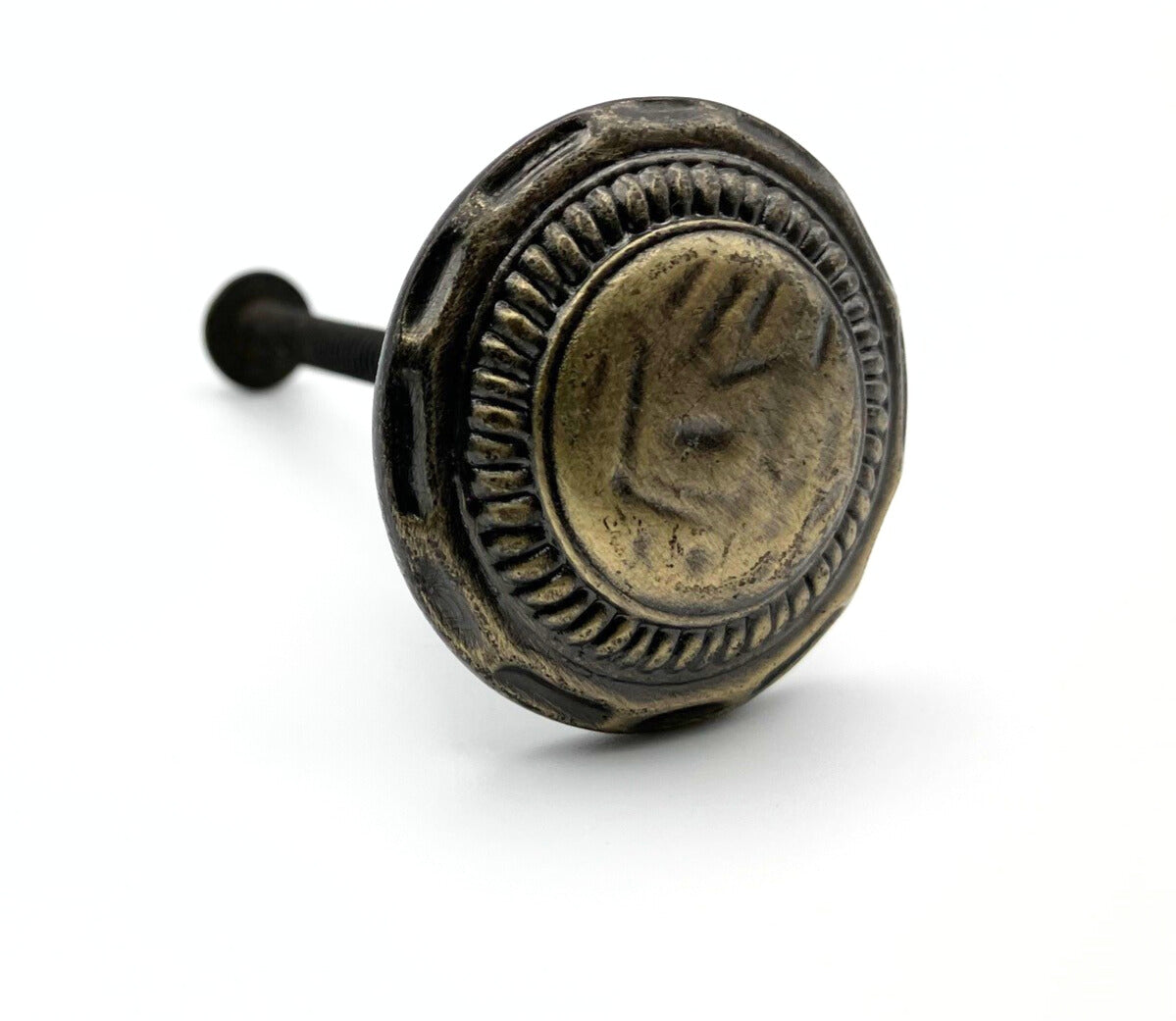 Decorative metal knob on a white background