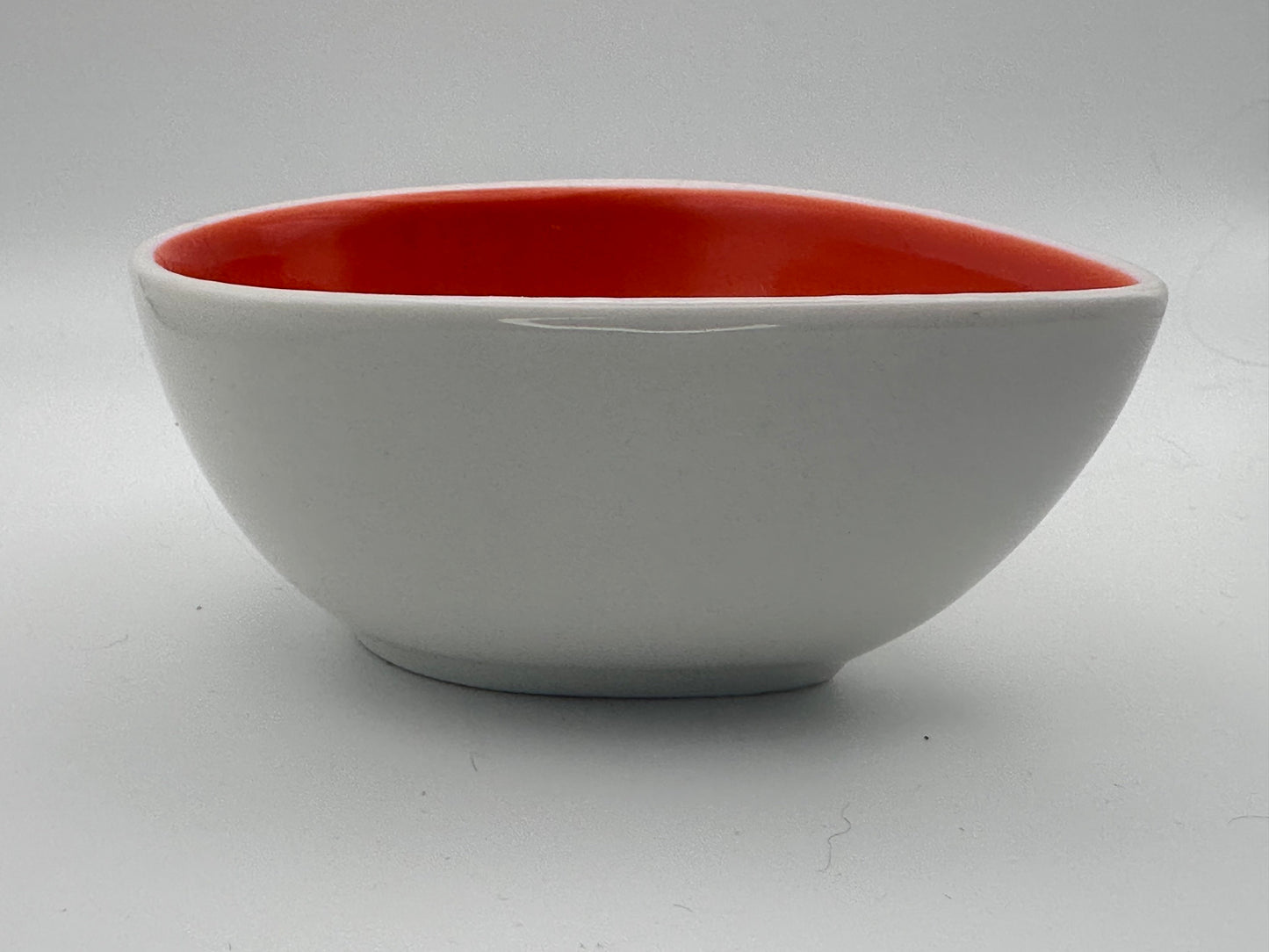 Small Teardrop Ceramic Bowl with Orange Interior