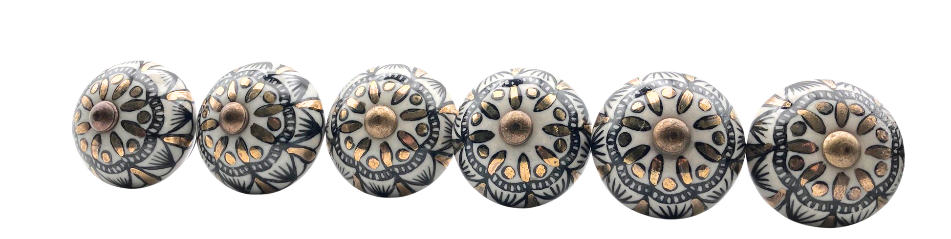 Set of decorative metal knobs with intricate designs on a white background