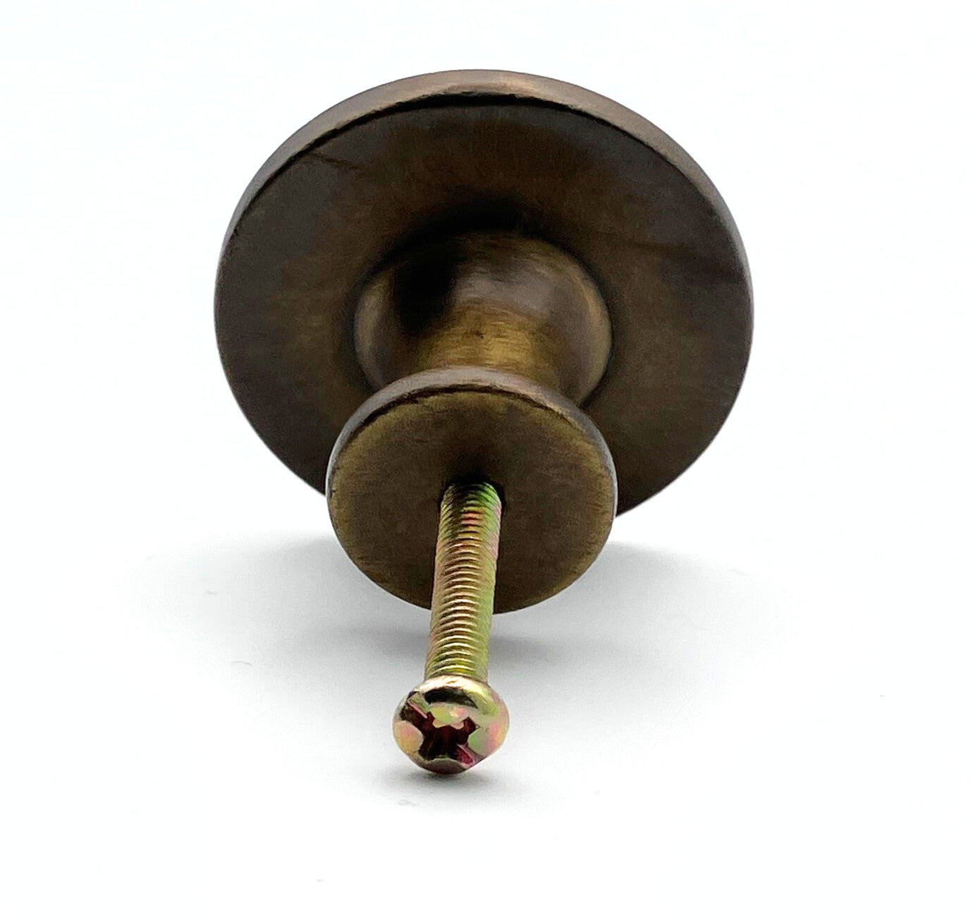 Metal knob with a screw on a white background
