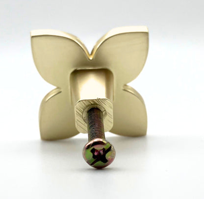 4 petal gold brass knob with pink petals inset into each section