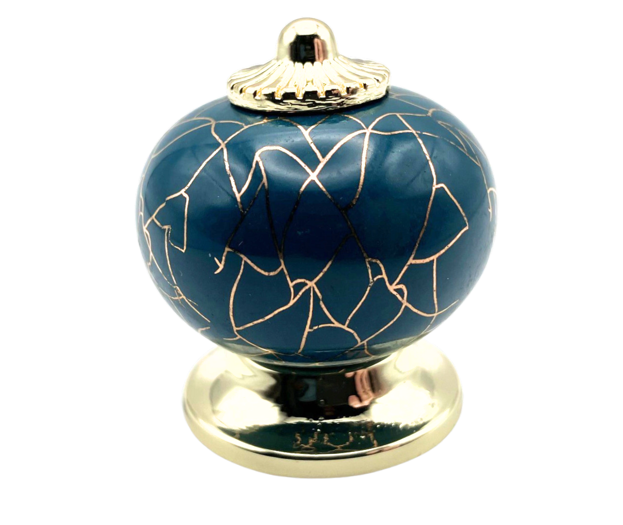blue round shaped knob with rose gold crackle design and gold metal hardware
