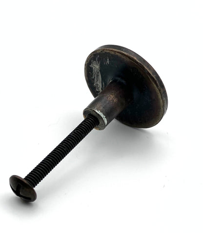 Round Metal knob with a threaded shaft on a white background