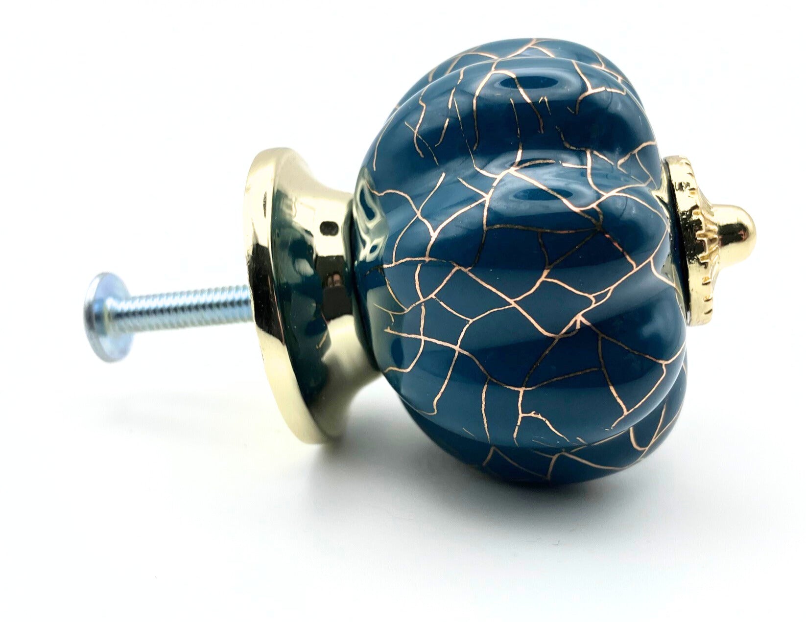 blue pumpkin shaped knob with rose gold crackle design and gold metal hardware