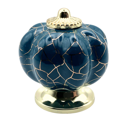 blue pumpkin shaped knob with rose gold crackle design and gold metal hardware