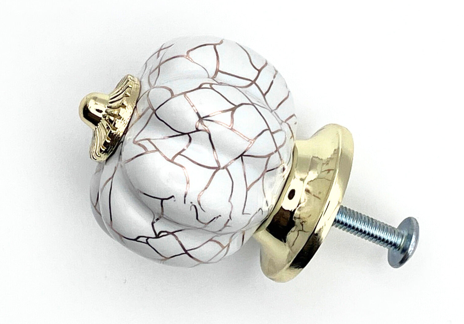 white pumpkin shaped knob with rose gold crackle design and gold metal hardware
