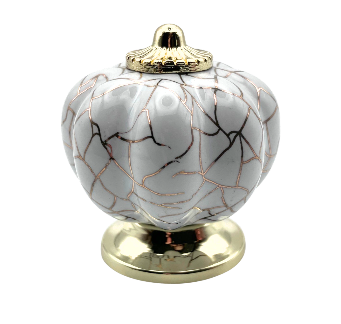White pumpkin shaped knob with rose gold crackle design and gold metal hardware