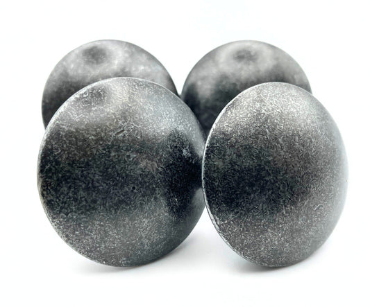 Set of four vintage solid grey and silver round cabinet knobs with classic minimalist design