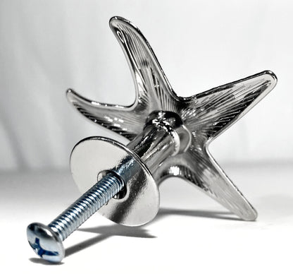 Metal star-shaped knob on a white background