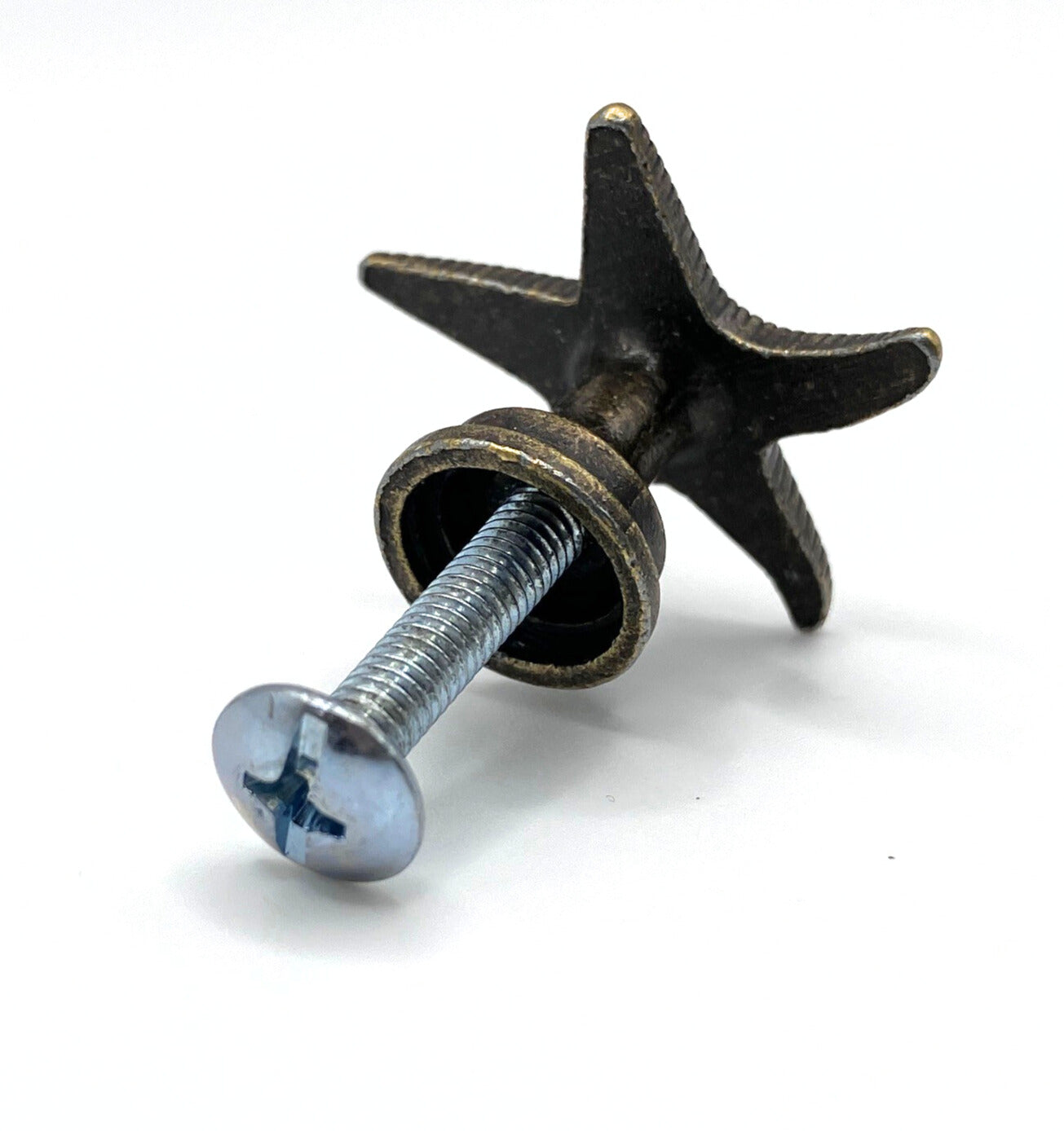 Bronze starfish-shaped knob on a white background