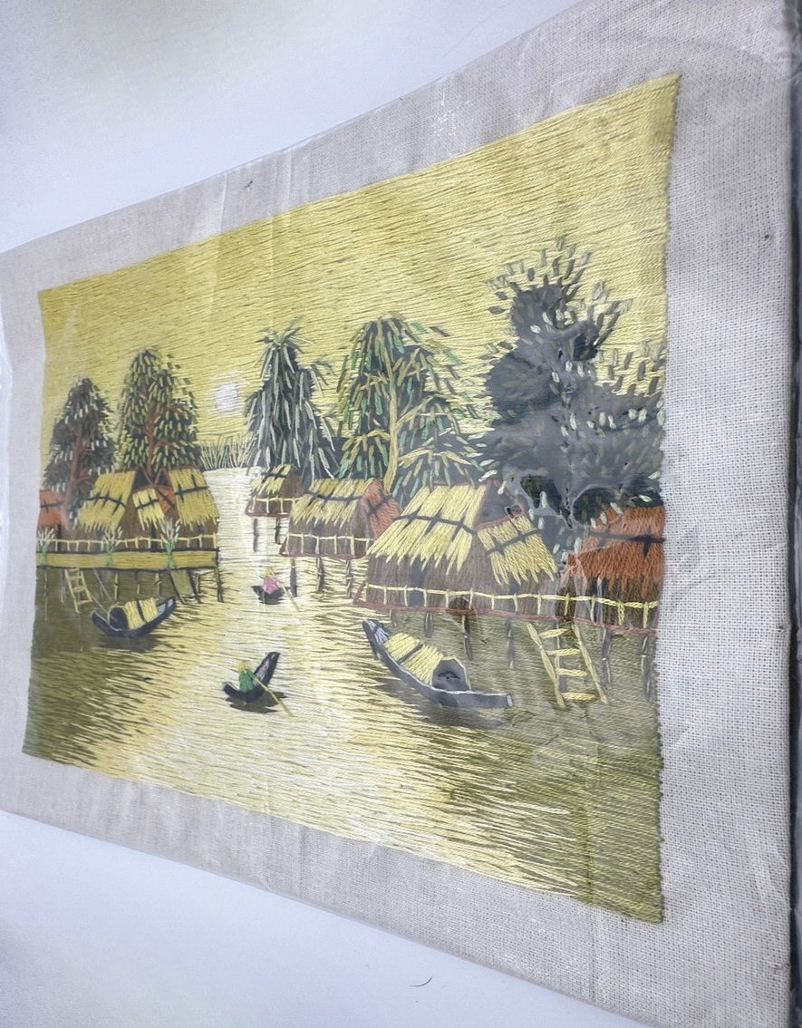 Vintage Southeast Asian yellow silk thread art from the 1970s with detailed handmade embroidery