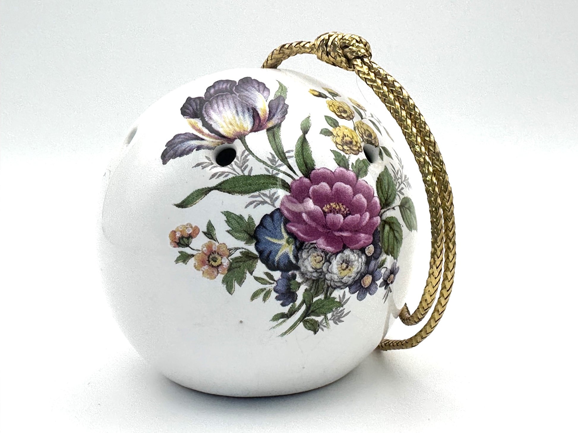 Vintage bone china pomander ball by Sallie Robinson showcasing intricate floral details and timeless cottage charm