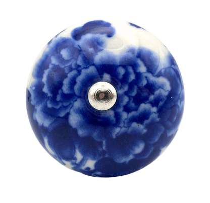Blue and white floral ceramic knob on a white background