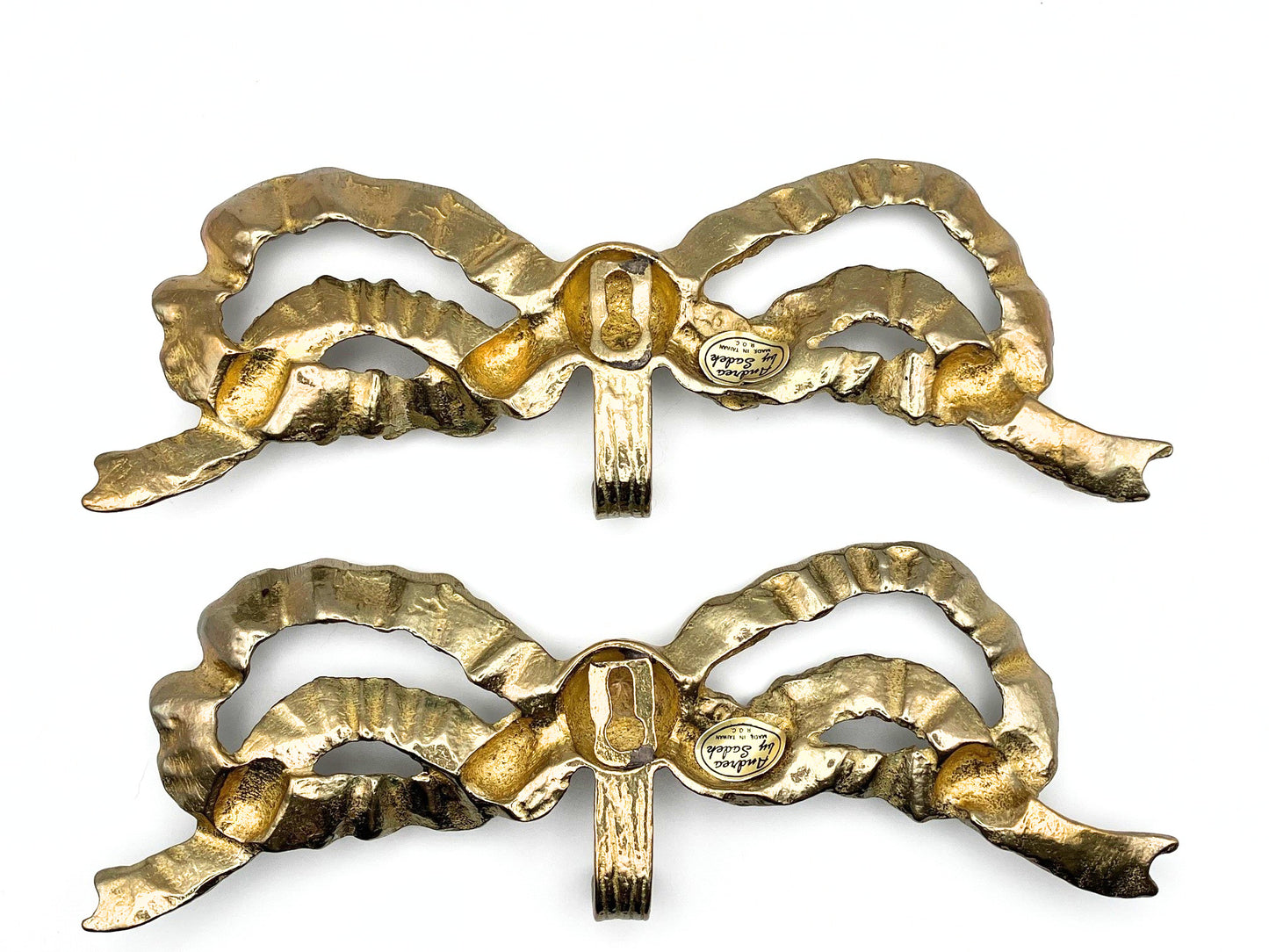 2 brass gold bow wall hooks