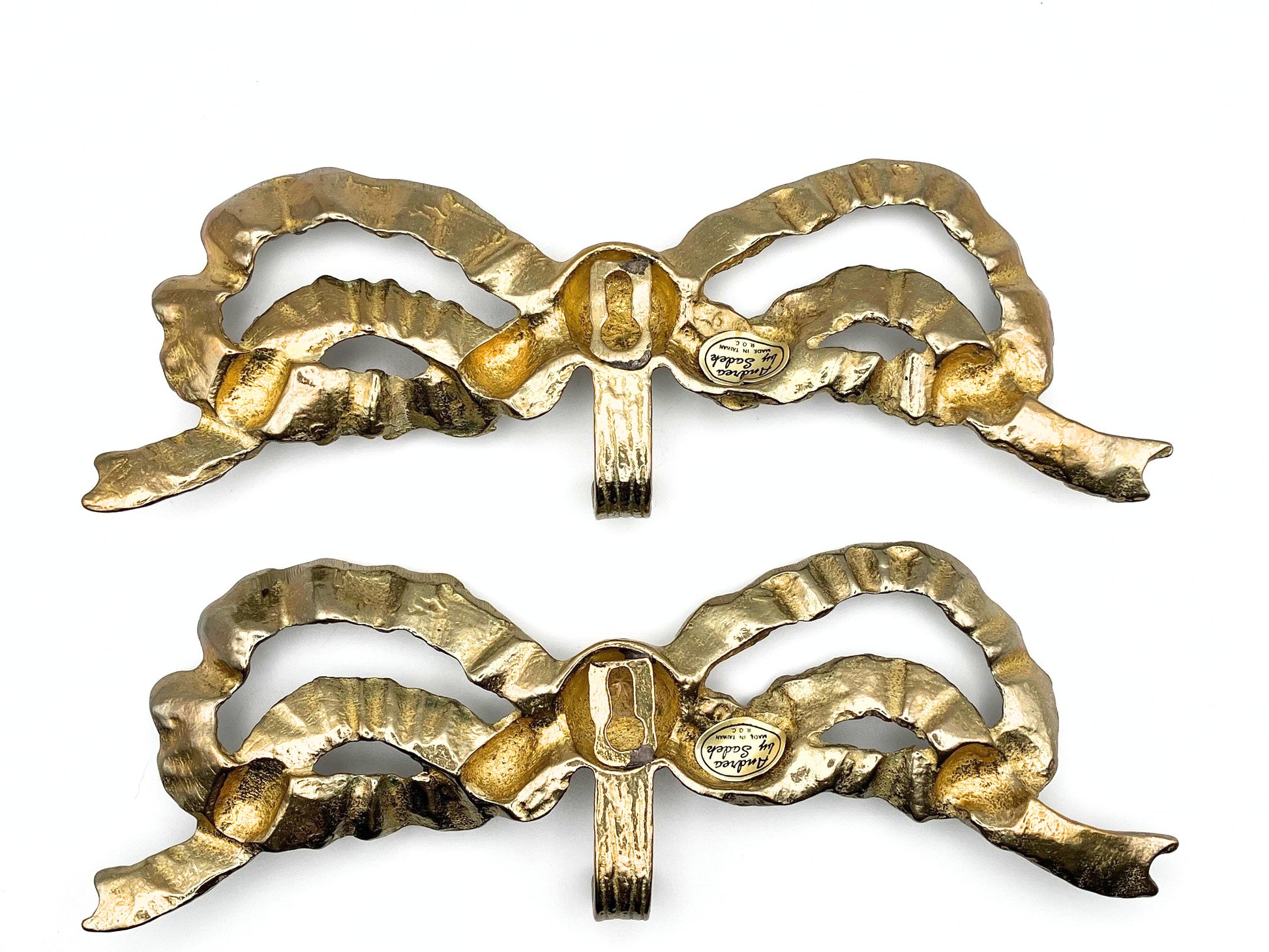 2 brass gold bow wall hooks