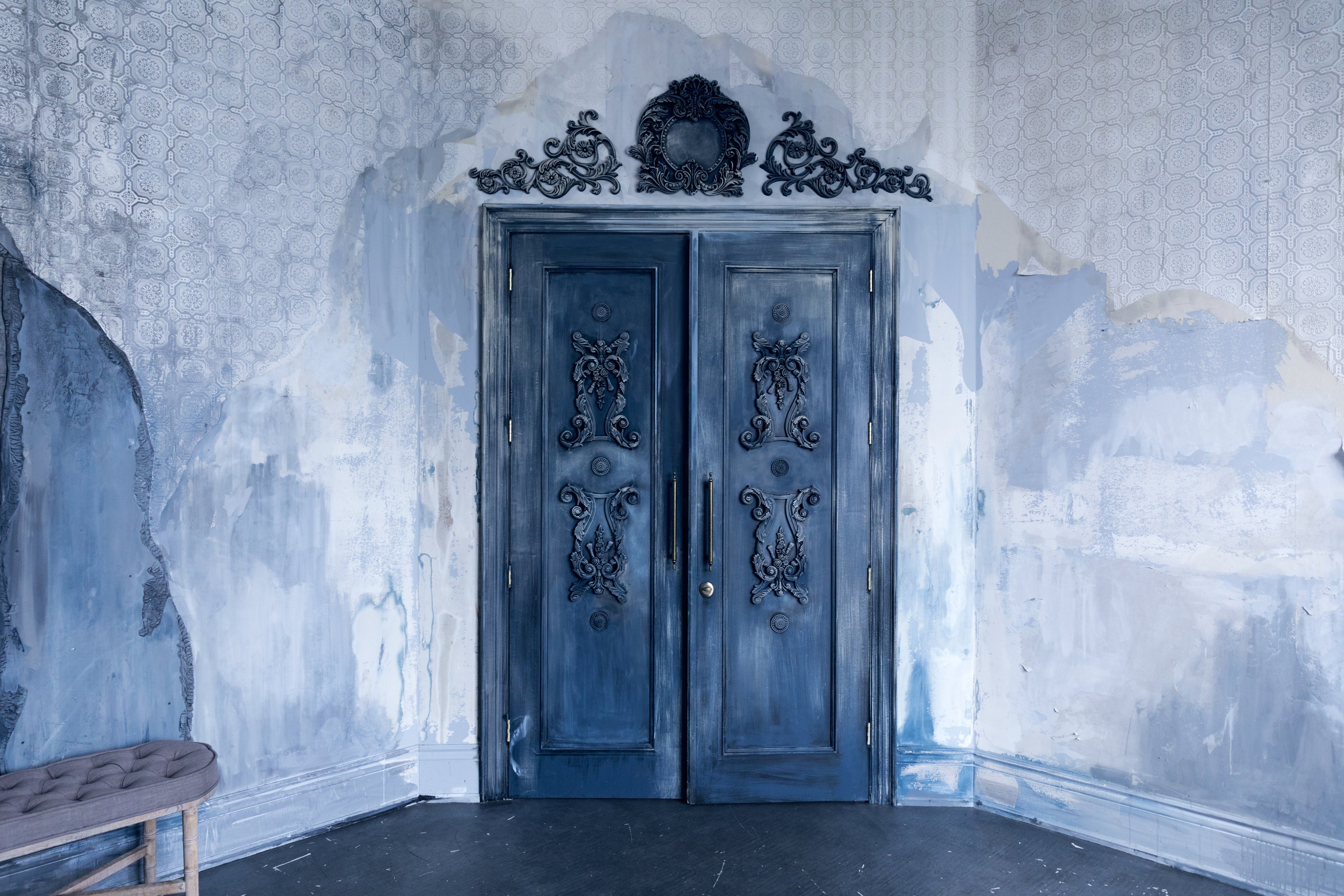 aging antique doors in blue wash